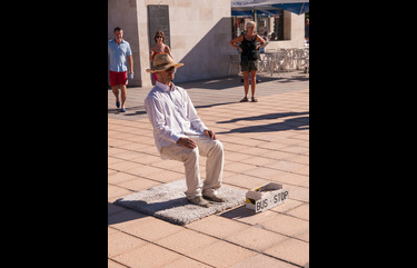 A Day In The Life Of A City Street Performer